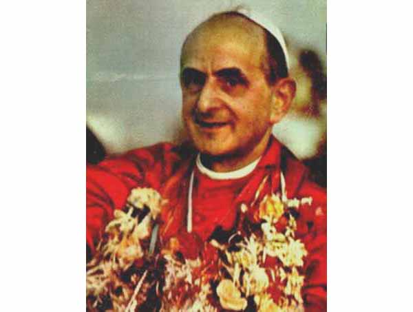 Paul VI wearing flower garlands in India